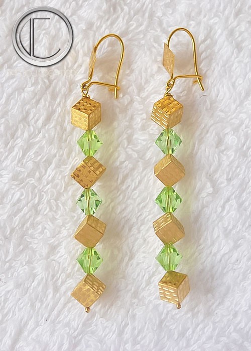 Boucles d oreilles cubes.Or 750/1000