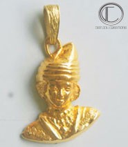 Pendentif Tete antillaise.Or 750/1000