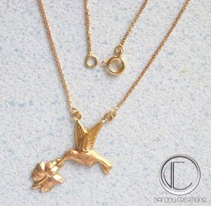 collier colilbri.Or 750/1000
