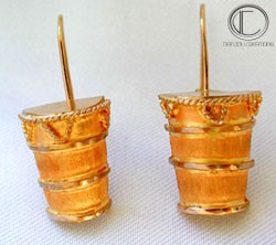 Boucles d' oreilles T ambour.Or 750/1000