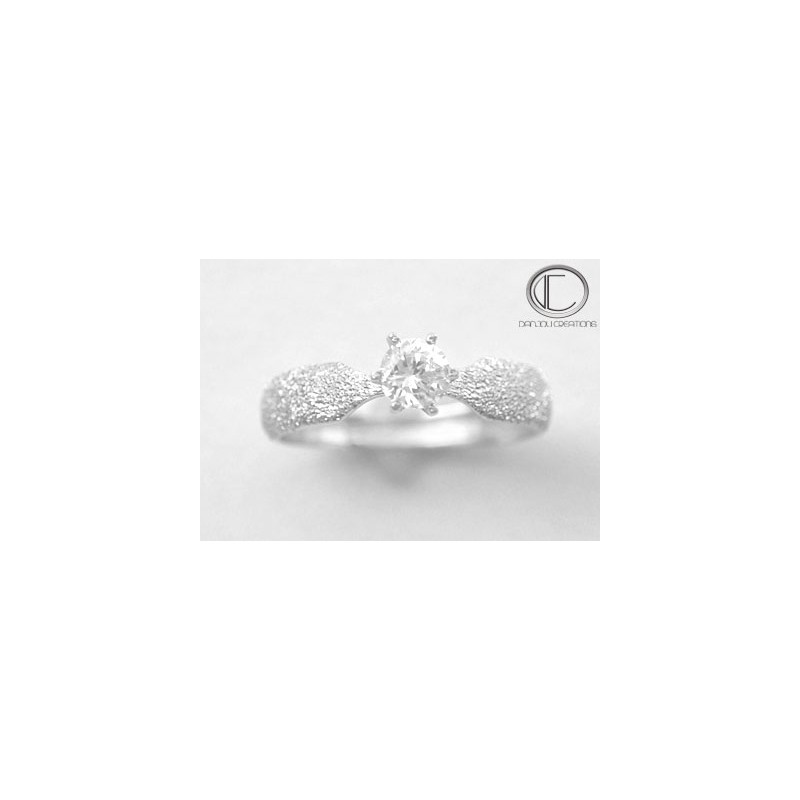 BAGUE  STELLA.Or 750/1000.