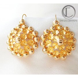 Boucles d' oreilles Tété nègrèsse.Or 750/1000 Boucles  3 rangéés de...