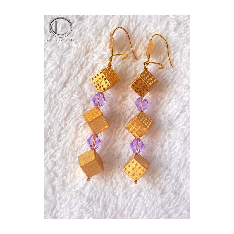 Boucles d oreilles cubes.Or 750/1000