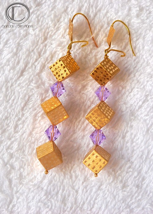 Boucles d oreilles cubes.Or 750/1000