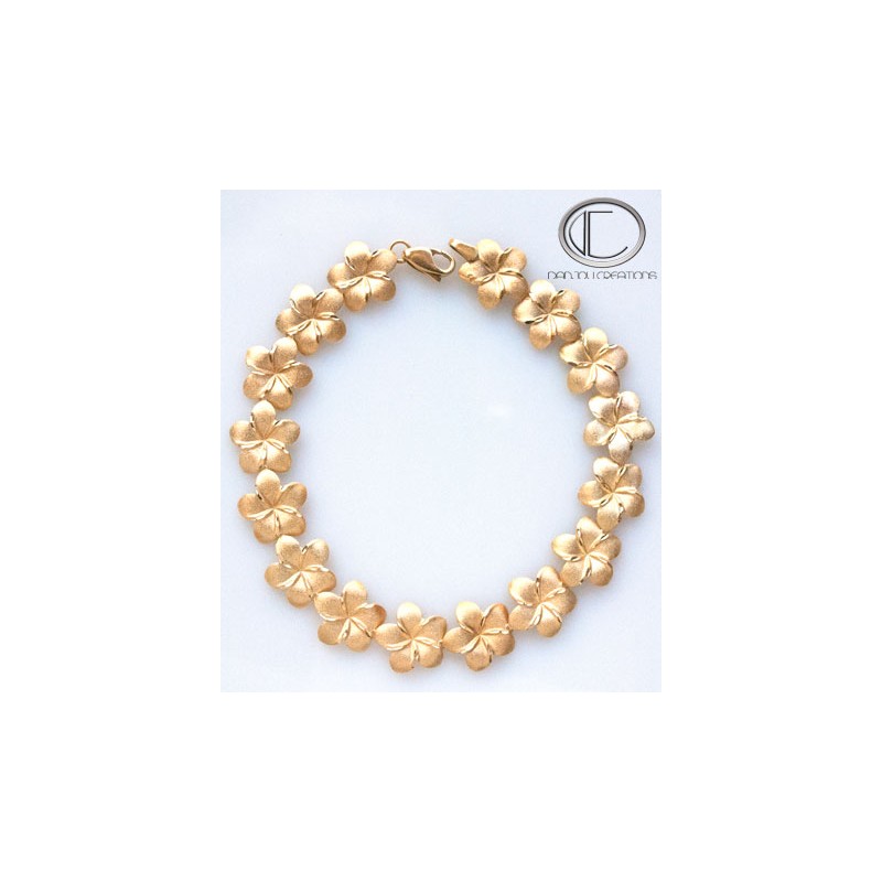 Bracelet Hibiscus.Or 750/1000 BRACELET  14 HIBISCUS Longueur : 22cm...