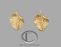 BOUCLES d' OREILLES ANTHURIUM.OR 750/1000
