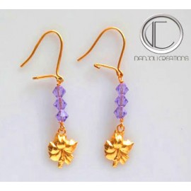 Boucles d oreilles hibiscus.Or 750/1000