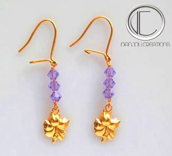 Hibiscus earrings. Gold 750/1000