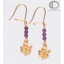 Boucles d oreilles hibiscus.Or 750/1000