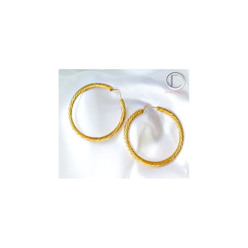 BOUCLES CREOLES. TORSADEES.OR 750/1000.
