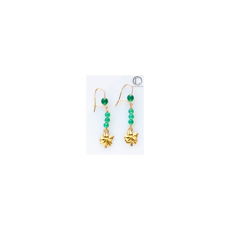 Boucles d oreilles hibiscus.Or 750/1000