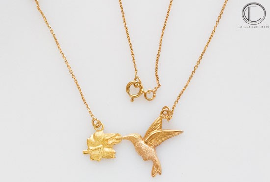 collier colilbri.Or 750/1000