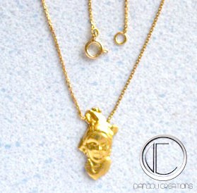 Collier Tetes Antillaises .OR 750/000.