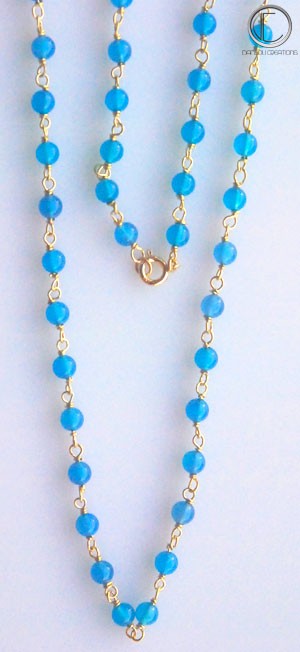 COLLIER AGATHE BLEU. OR 750/1000.