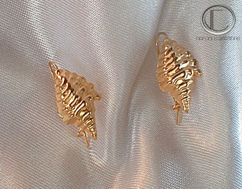 boucles d'oreilles conque.Or 750/1000