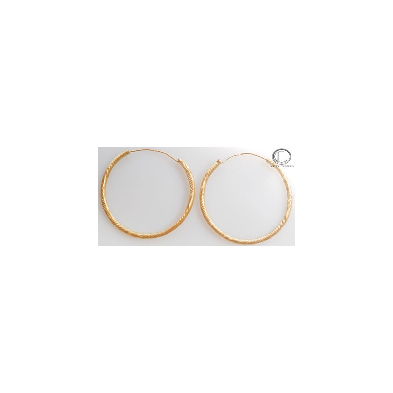 Boucles d'oreilles créoles.Or 750/1000