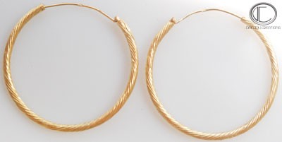 Boucles d'oreilles créoles.Or 750/1000
