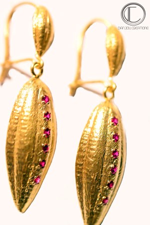 BOUCLES CABOSSES DE CACAO.Or 750/1000
