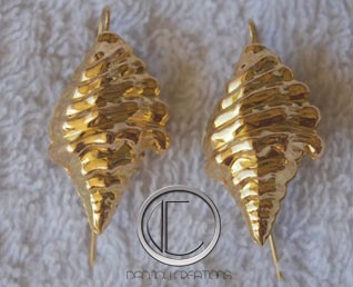 boucles d'oreilles conque.Or 750/1000