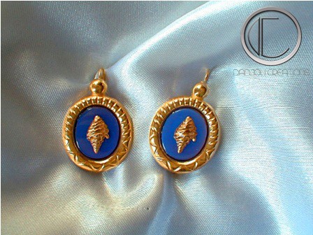 Pendientes caracola.Oro 750/1000