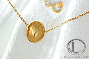 COLLIER BAKOUA.Or 750/1000