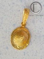 Pendentif bakoua.Or 750/1000