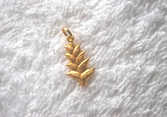 Pendentif balisier.Or 750/1000