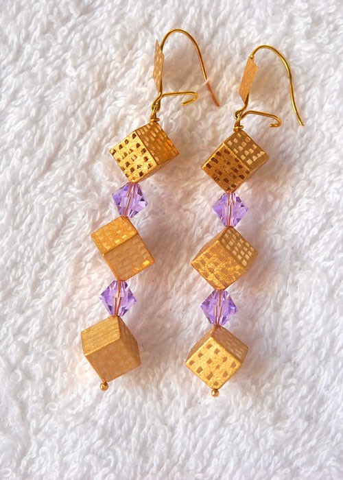 Boucles d oreilles cubes.Or 750/1000