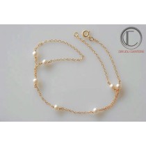 Bracelet main  perle fine.Or750/100