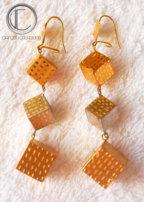 Pendientes cúbicos.Oro 750/1000