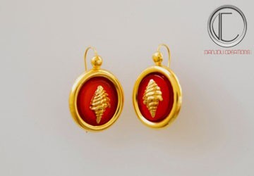 boucles d' oreilles conque.Or 750/1000