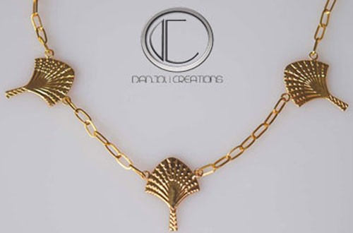 Collar 3 árboles viajeros. oro de 18 quilates