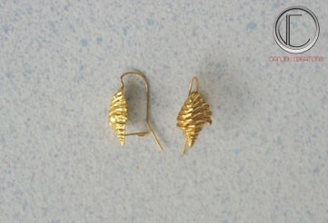 Boucles d'oreilles conque.Or 750/1000