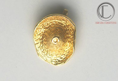Pendentif bakoua.Or 750/1000