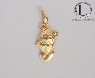 PENDENTIF  TETE ANTILLAISE.Or 750/1000