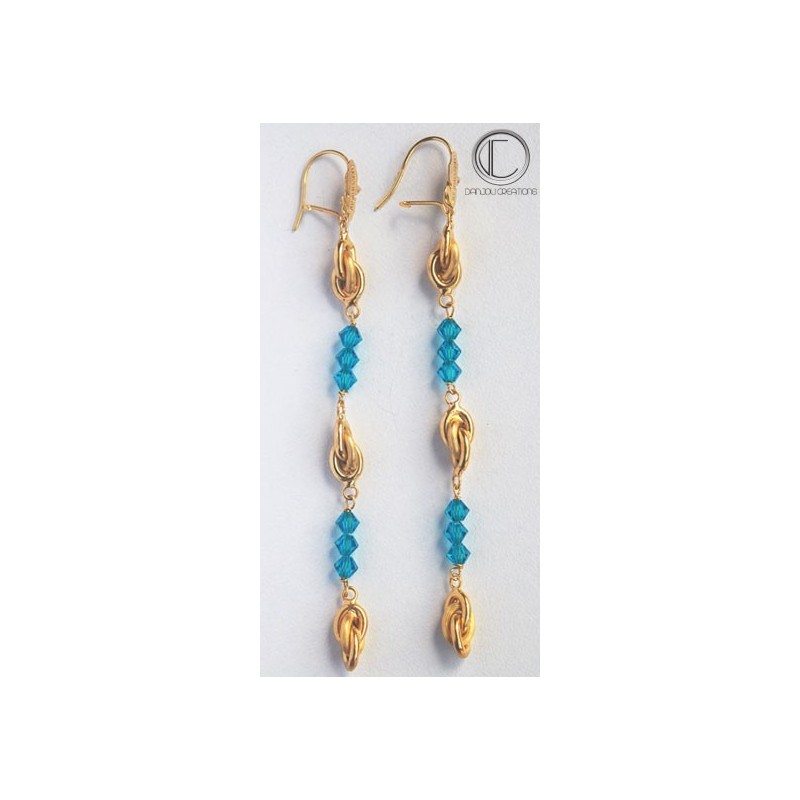 Boucles d'oreilles forcats .Or 750/1000