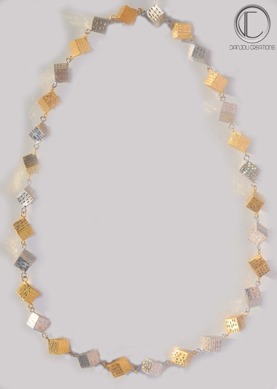 CUBIC NECKLACE .Or 750/1000
