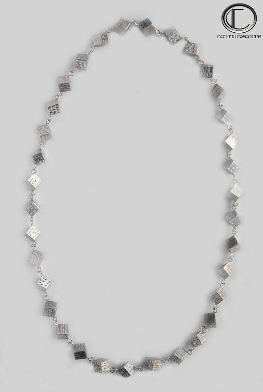 CUBIC NECKLACE .Or 750/1000