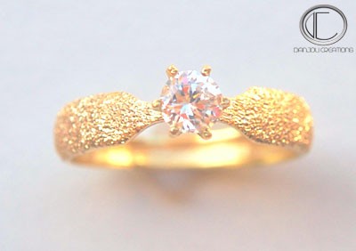 BAGUE  STELLA.Or 750/1000.