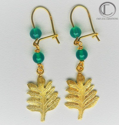 BOUCLES d' OREILLES FRUIT A PAIN.OR 750/1000