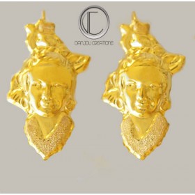 BOUCLES TETES ANTILLAISES.OR 750/1000